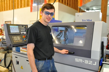 Man at SR-32J Swiss machine photo of man at SR-32J Swiss machine